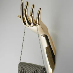 Appendino umano in oro