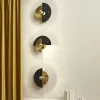 Applique Levante in ottone lucido e marmo Marquina