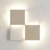Applique Modulare X in ferro con finitura bianca e pietra beige
