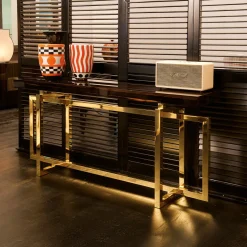 Console Charlotte con base in metallo placcato ottone