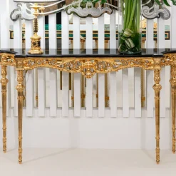 Console dorata e nera in stile Luigi XVI