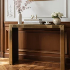 Console Materia con telaio in oro e piano in vetro fumé