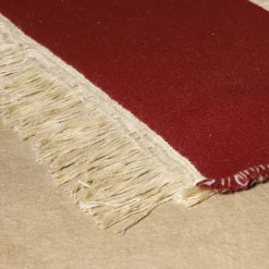 Coperta Ciconi in lana e lino con frange beige e rosse