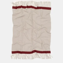 Coperta con frange a banda rossa