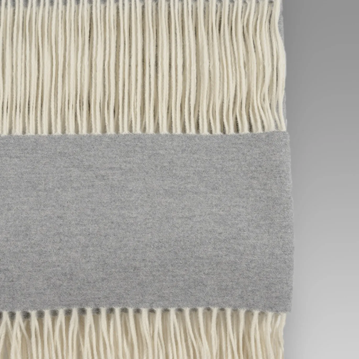 Coperta piccola grigia con frange Defilé