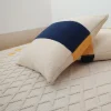 Cuscino ecru, blu e giallo