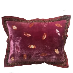 Cuscino in velluto con petali d'arancio