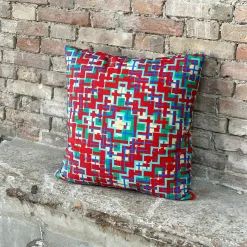 Cuscino in velluto rosso con motivo Ducale