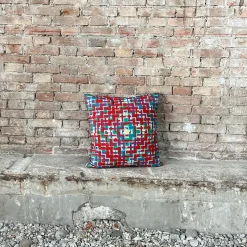 Cuscino in velluto rosso con motivo Ducale