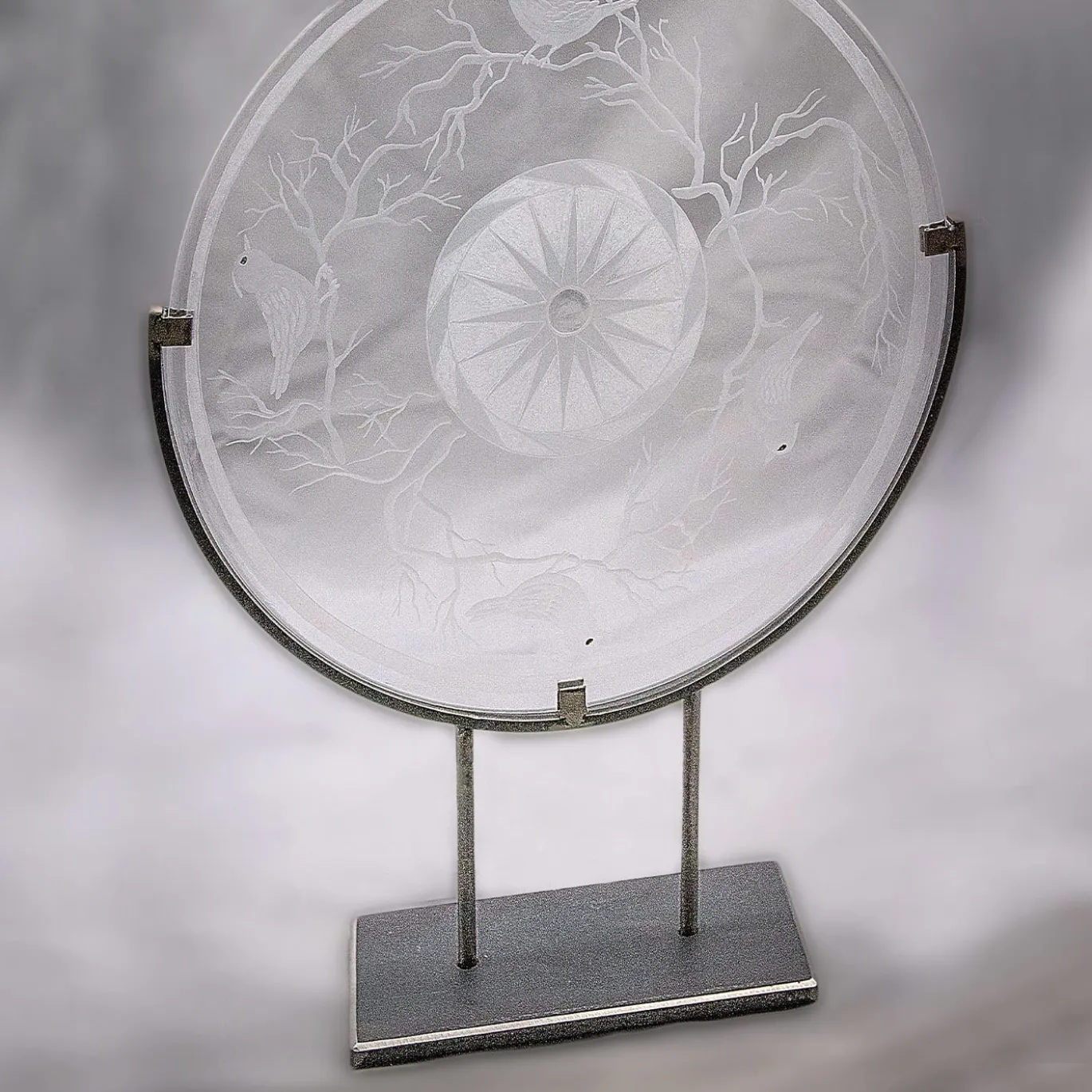Disco/scultura di uccelli