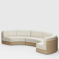 Divano modulare Serra Curved Melange-bianco Bouclè e legno di frassino massello di Artefatto Design Studio