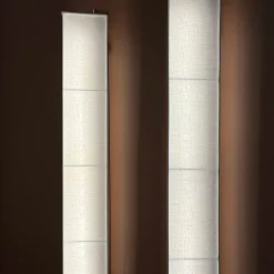 Lampada da parete grande Capanni in lino bianco e acciaio
