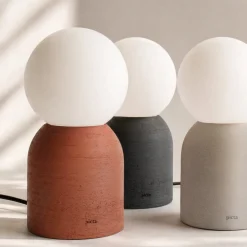 Lampada da tavolo Lume in gres nero e vetro opalino