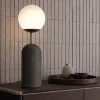 Lampada da tavolo Sfera in gres nero e vetro opalino