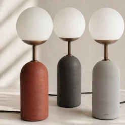 Lampada da tavolo Sfera in gres nero e vetro opalino