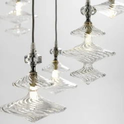 Lampadario a 12 luci con trottole in vetro