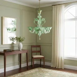 Lampadario Avior in vetro verde con dettagli dorati