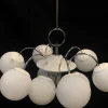 Lampadario Stilnovo a 9 luci cromate