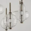 Lampadario Trinity 02 in bronzo di Mike Shilov