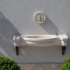 Lavabo semicircolare Sethra in travertino