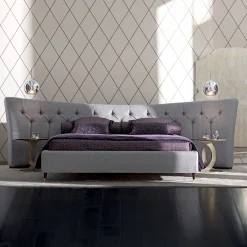 Letto Butterfly grigio imbottito con testiera capitonnè