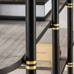 Libreria Boomerang in metallo nero e ottone con 6 ripiani di Pietro Russo Design