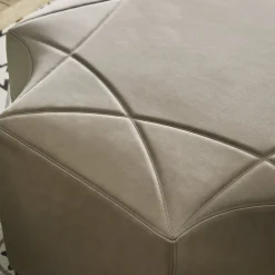 Ottomano esagonale in pelle nabuk beige