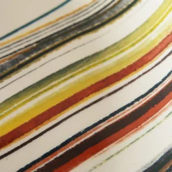 Piatto decorativo rotondo in ceramica con motivo a righe artistiche 1