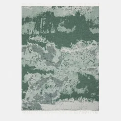 Plaid in lana verde jacquard con motivo stucco