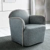 Poltrona Ada in tessuto azzurro e piping di Paola Navone