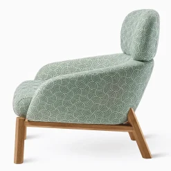 Poltrona Elton in tessuto verde e legno di faggio di Francesca Lanzavecchia