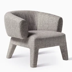 Poltrona Lola in tessuto greige di Paola Navone