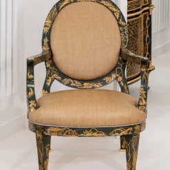 Poltrona verde scuro e dorata in stile Déco