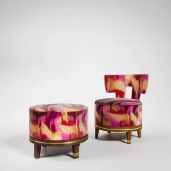 Poltroncina Lounge Rotonda Charles K in tessuto Rosso Reimei