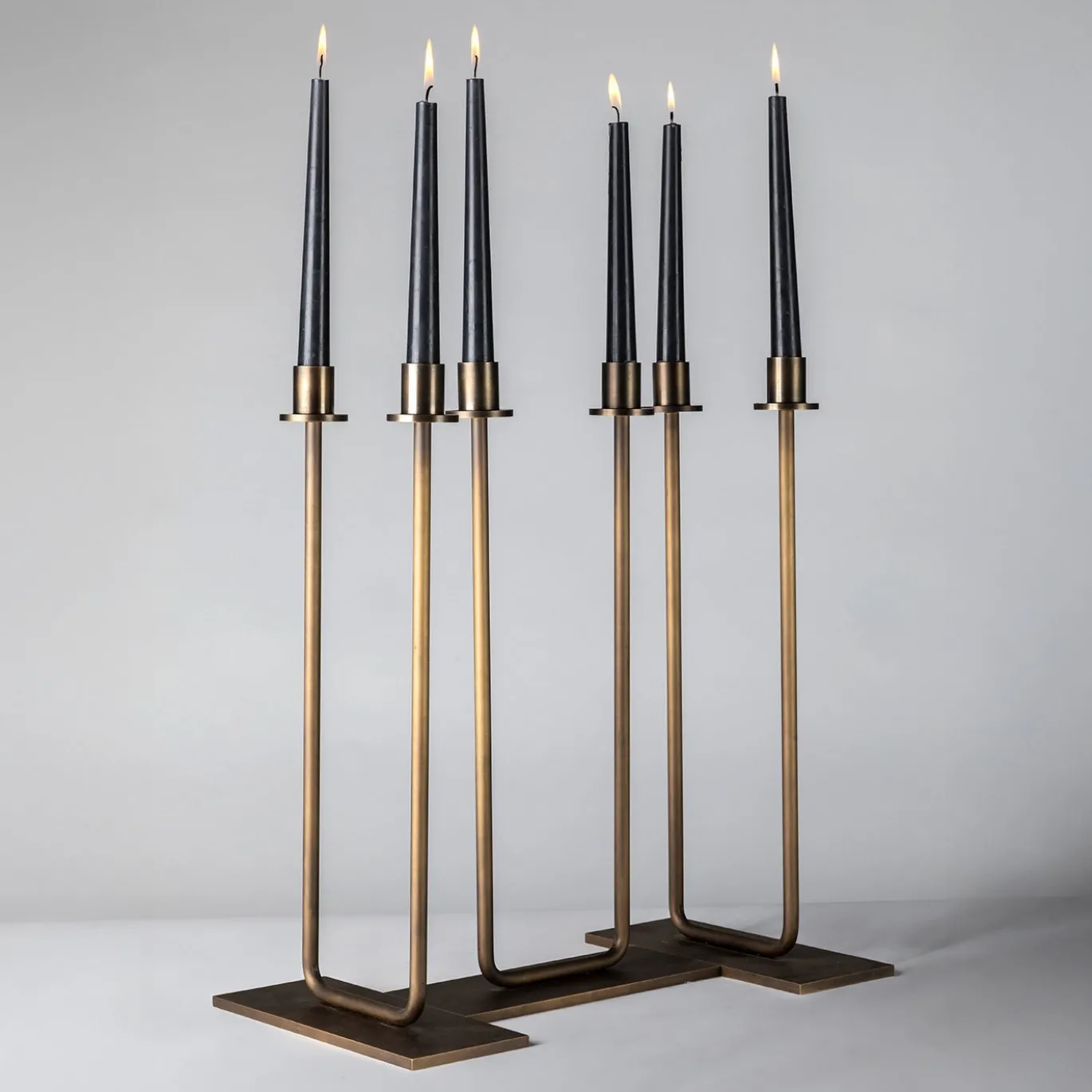 Portacandele doppio Gemini in ottone bronzato