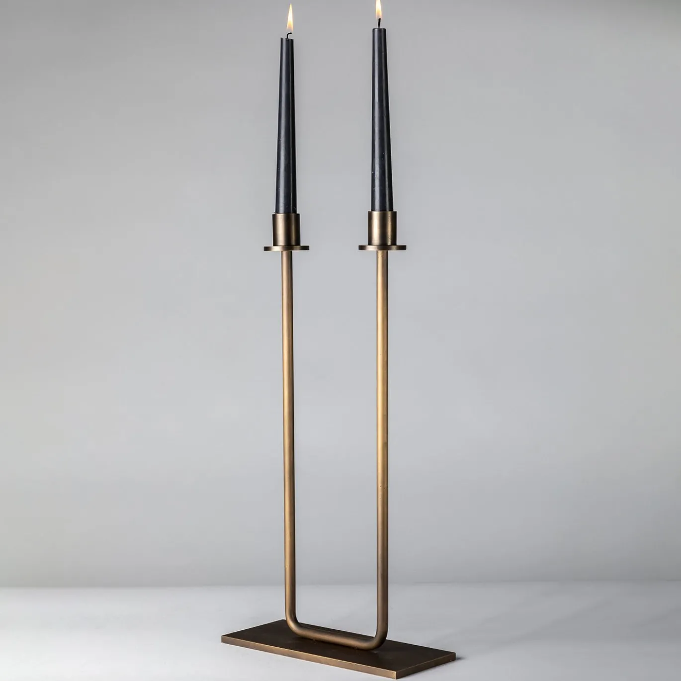 Portacandele doppio Gemini in ottone bronzato