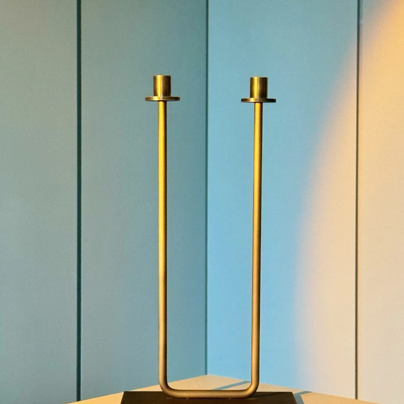 Portacandele doppio Gemini in ottone bronzato
