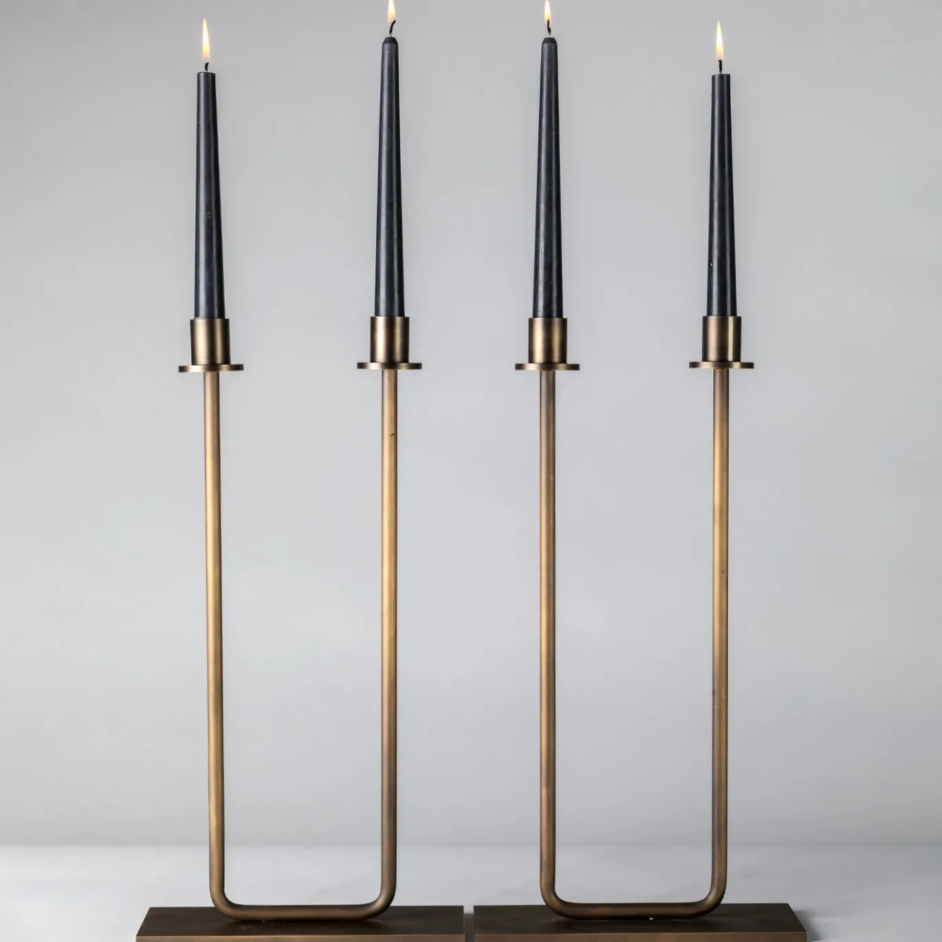 Portacandele doppio Gemini in ottone bronzato
