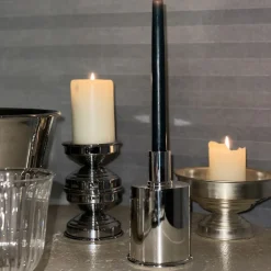 Portacandele scultoreo in ottone placcato argento