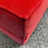 Pouf in velluto rosso Docker