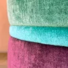 Pouf tondo in velluto verde acqua e viola con ricamo