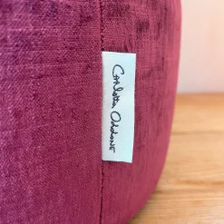 Pouf tondo in velluto verde acqua e viola con ricamo