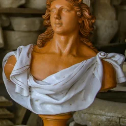 Scultura busto di Apollo in smalto bianco e terracotta