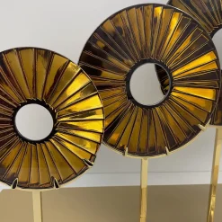 Scultura in vetro ambrato a tre occhi
