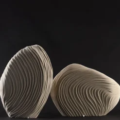 Scultura luminosa orizzontale in pietra leccese Madrepora