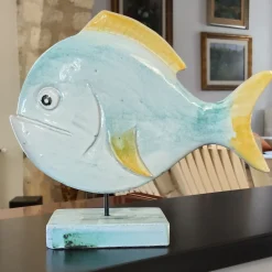 Scultura Pesce Tondo in pietra vulcanica smaltata blu e gialla