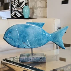 Scultura Pesce Turchese in pietra vulcanica smaltata