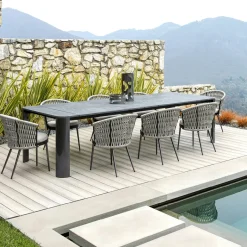 Sedia in tessuto grigio per esterni con cuscino