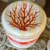 Seduta scultorea 4 cuscini gialla con decorazione in corallo rosso