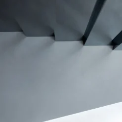 Specchio da parete Mirage con scultura in bronzo e acciaio argento